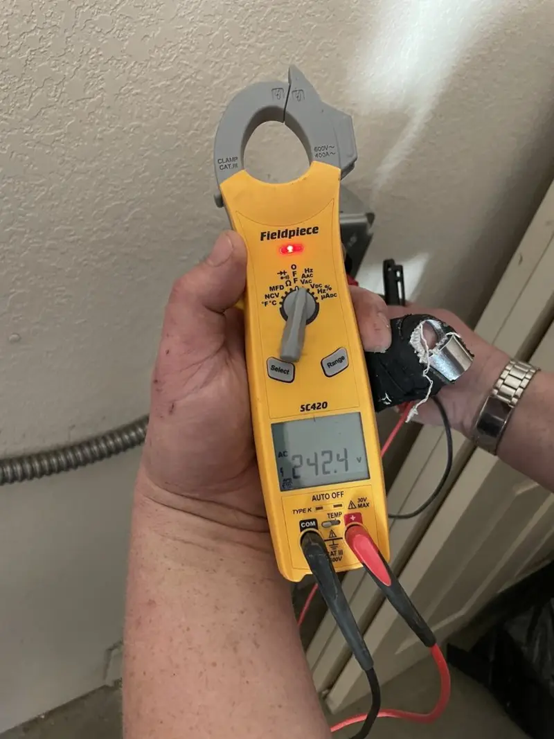 Voltage testing with clamp meter during Hot Tub / Pool Electrical Wiring in Birmingham